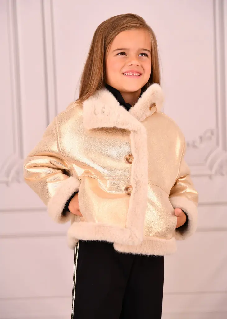 Petra_Jacket_Gold_Lifestyle.webp